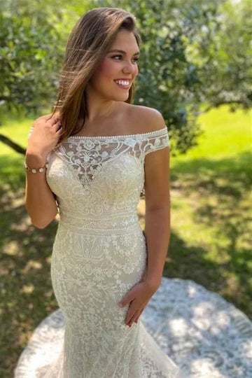 Vestido de novia sirena de encaje con hombros descubiertos